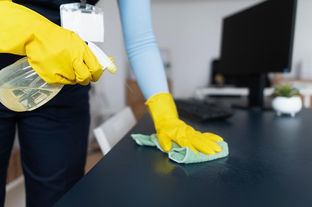 Cleaner wiping desk